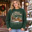 Female model wearing the green White Christmas sweatshirt