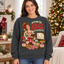Female model wearing the Holiday Snack Quality Control sweatshirt