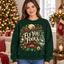 Male model wearing the Fly You Fools Santa sweatshirt