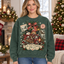 Female model wearing the Christmas sweatshirt