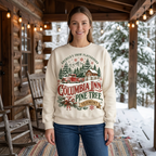 Female model wearing the Columbia Inn sweatshirt