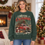 Female model wearing the Let It Snow Christmas sweatshirt