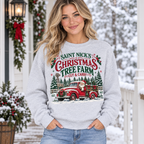 Female model wearing the Saint Nick’s Christmas Tree Farm sweatshirt