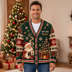 Male model wearing the forest-green Santa and fireplace cardigan