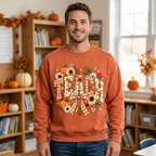Male model wearing the orange TEACH sweatshirt