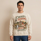 Male US model wearing the Chicken Raising and Jesus Praising sweatshirt